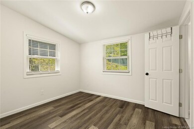 Main bedroom w/ attached bath