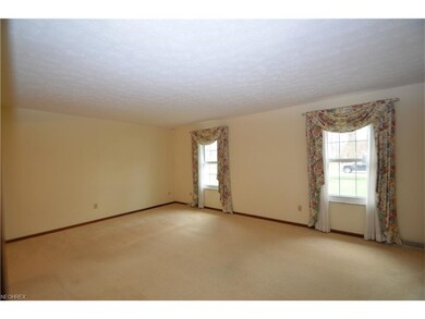 Two large windows in the living room for natural l