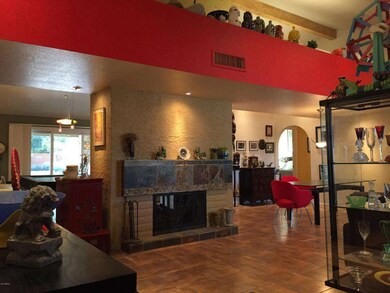 Entry with Central Fireplace