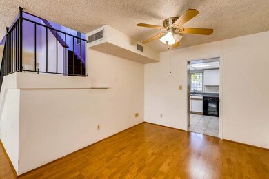 Dining with entrance to kitchen