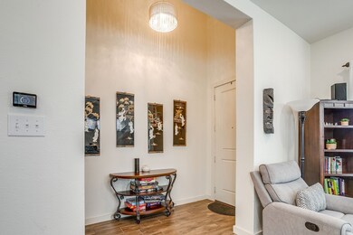 Foyer featuring High ceiling and beautiful chandelier