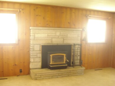 Family Room w/woodburning fireplace
