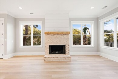Large living room with gas fireplace.