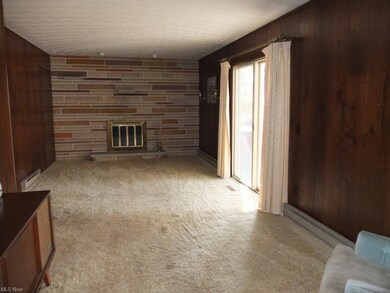 Family room with fireplace.