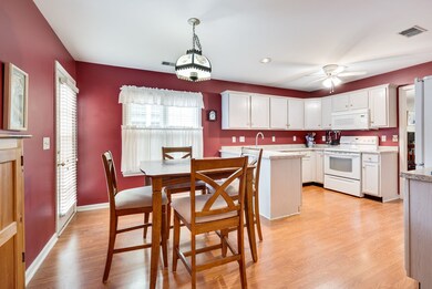 Kitchen dining area with door leading to the patio.