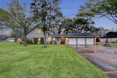 3 car detached garage with oversized driveway makes parking a breeze.