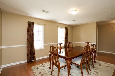 Spacious formal dining room as you enter this welcoming home.  
