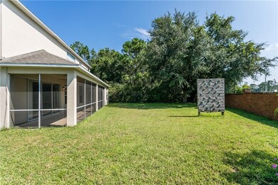 Backyard with Rock Climbing Wall and Screened Porc