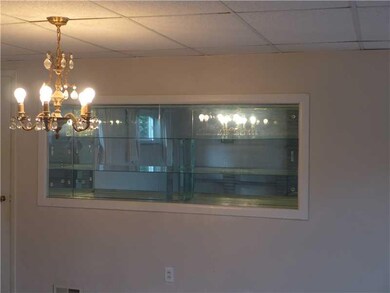Dining Room. Dining room area has built in glass a