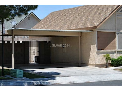 Property Photo. Carport to the side of the house