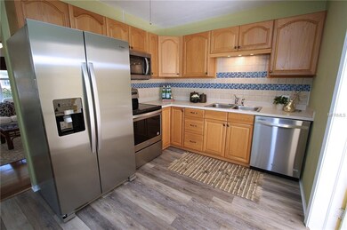 Kitchen off the living room with updated appliance