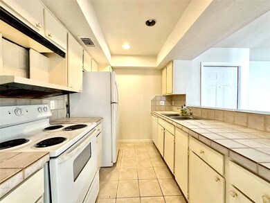open kitchen with lots of natural light and storag