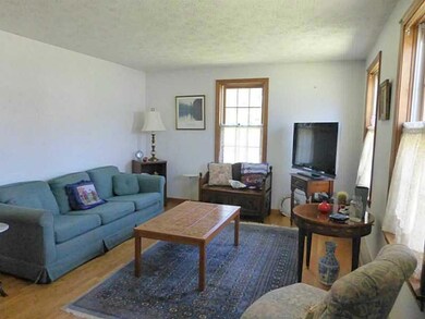 Living Room. SUNNY LIVING ROOM IS...