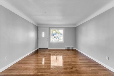 Unfurnished room featuring light wood-type flooring