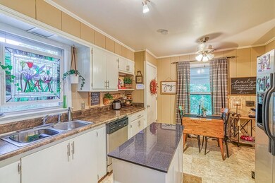 Galley kitchen with breakfast table