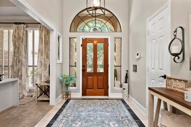 Just off the entry hall is the versatile study/hom