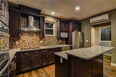 Kitchen work island with eat in bar, ductless mini split HVAC