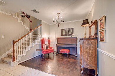 You have so many options with this space. It can be used as a home office, formal living or dining.