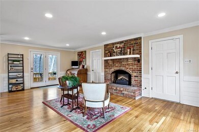 Inviting family room with gleaming hardwood floori
