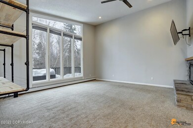 Living Room w/Wall of Windows