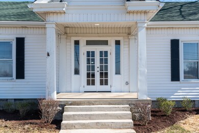 Front porch view leading into the Entry Foyer.