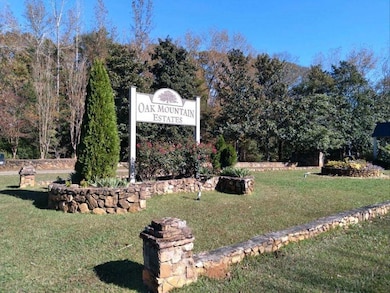 Community sign featuring a lawn
