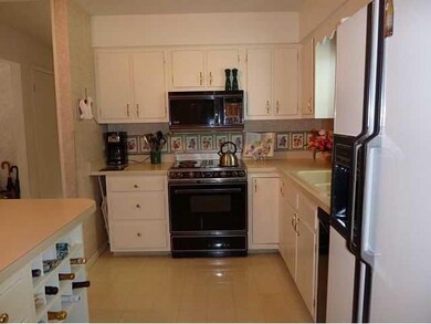 Kitchen BRIGHT AND SUNNY WITH CENTER ISLAND FOR SN