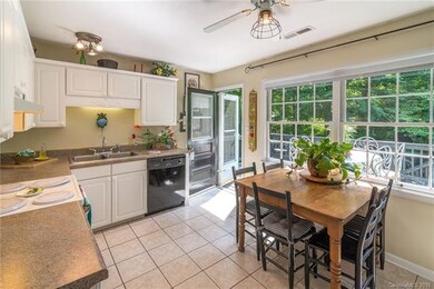 updated eat-in kitchen with access to large deck
