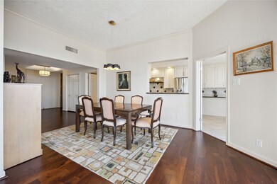 Dining area perfectly placed between kitchen and l