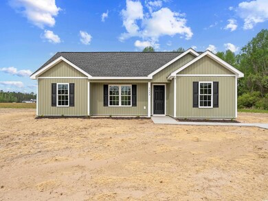 Single story home with roof with shingles