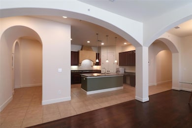 Kitchen featuring recessed lighting, dark countert