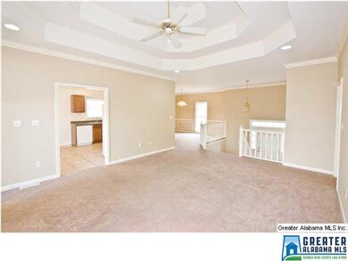 Living room opens up to large back deck.