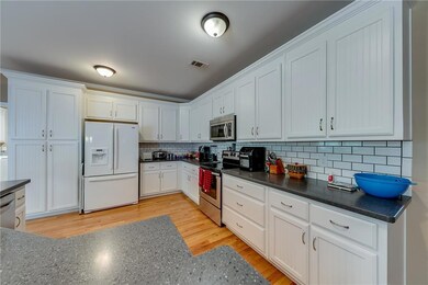 Kitchen featuring light hardwood / wood-style floo