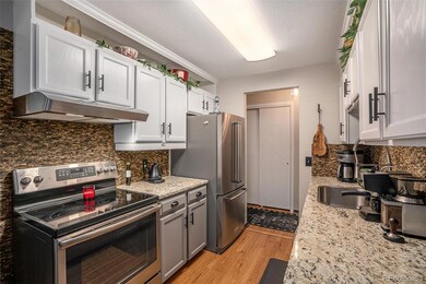 Walk-through kitchen with new stainless appliances