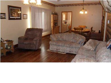 Living Room with orginal hardwood floors.