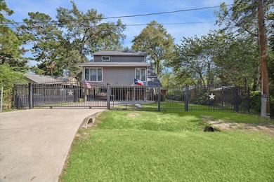 Home features beautiful curb appeal and two access