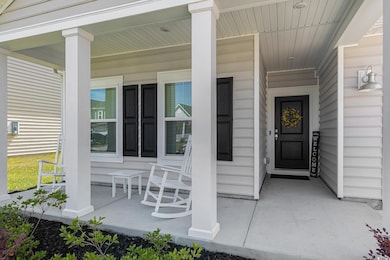 Doorway to property with a porch