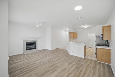 Unfurnished living room with light wood finished 