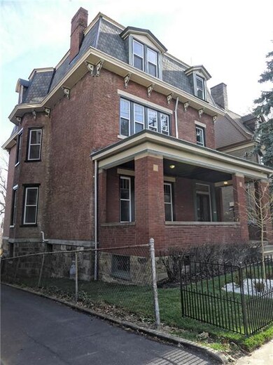 A large covered front porch and an expansive rear 
