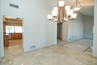 4 12246 N 86th Pl Dining Entry Living Ki