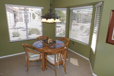 BREAKFAST NOOK HAS BAY WINDOW AND IS ADJACENT TO FAMILY ROOM AND KITCHEN