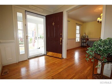 Formal foyer, hardwood floors, double crown mouldi