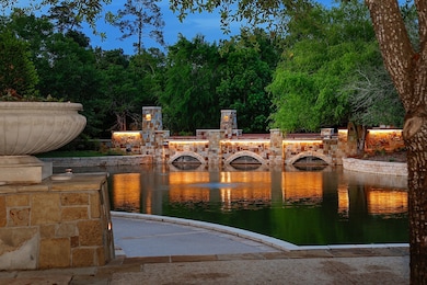 Pristine landscaping, stone accented gardens, path