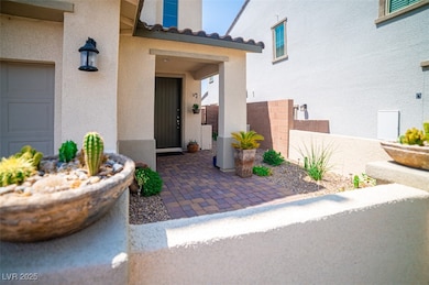 Doorway to property with stucco siding and a tile roof