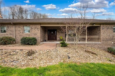 The lovely, landscaped front entry creates a wonde