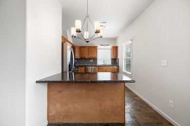 The granite bar is a great space for hosting and g