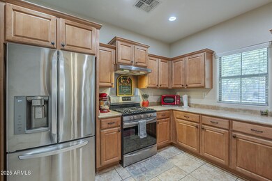 Warm wood tones meet sleek appliances