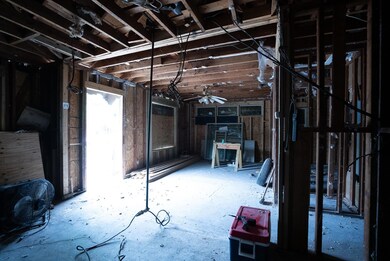 Basement featuring ceiling fan