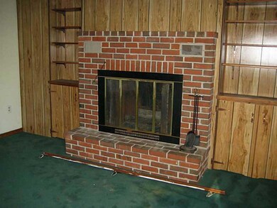 Exterior Front. Brick Fireplace in...