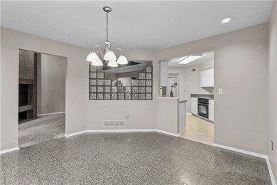 View from dining room looking to kitchen.   Family